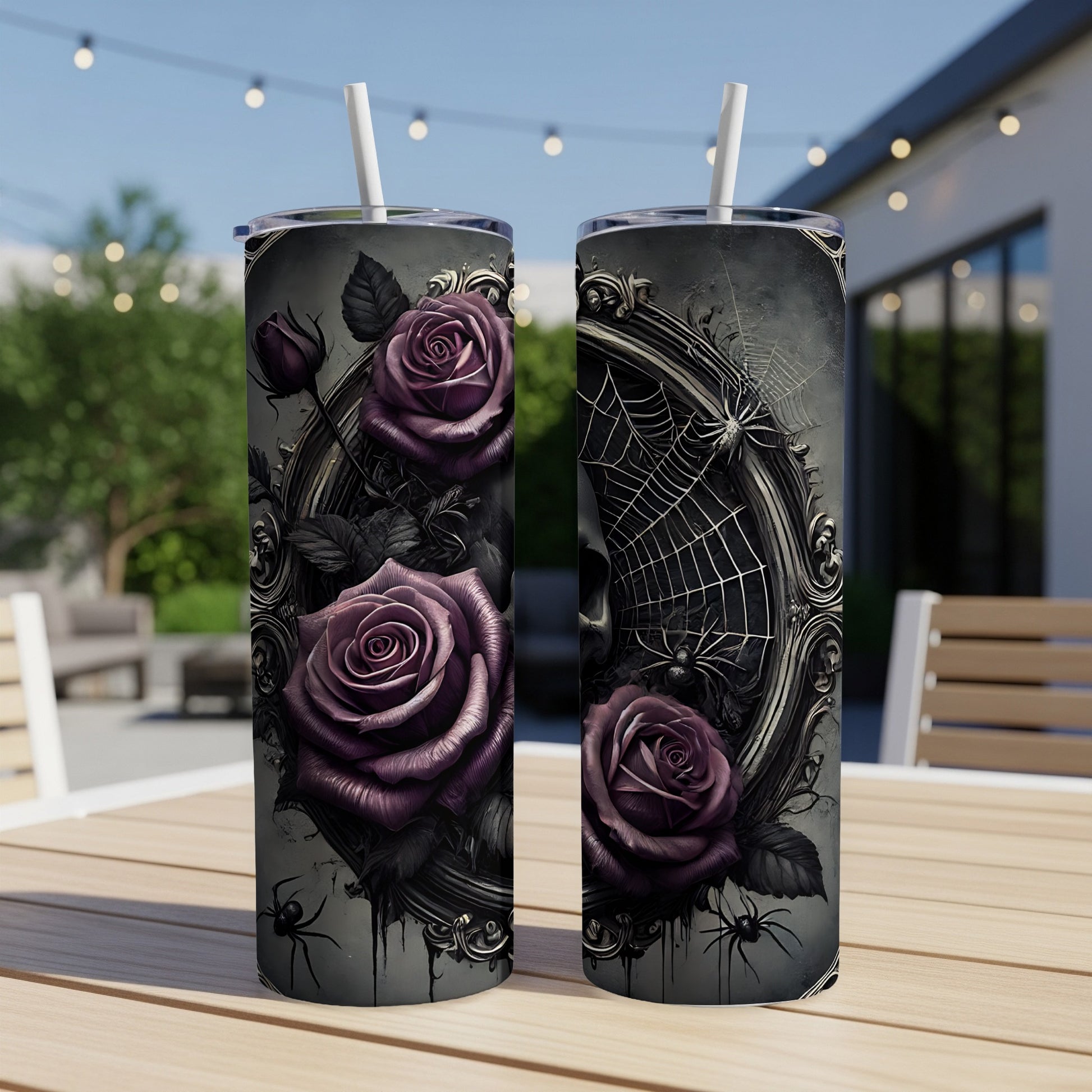 Gothic roses and spiderwebs on two insulated tumblers.