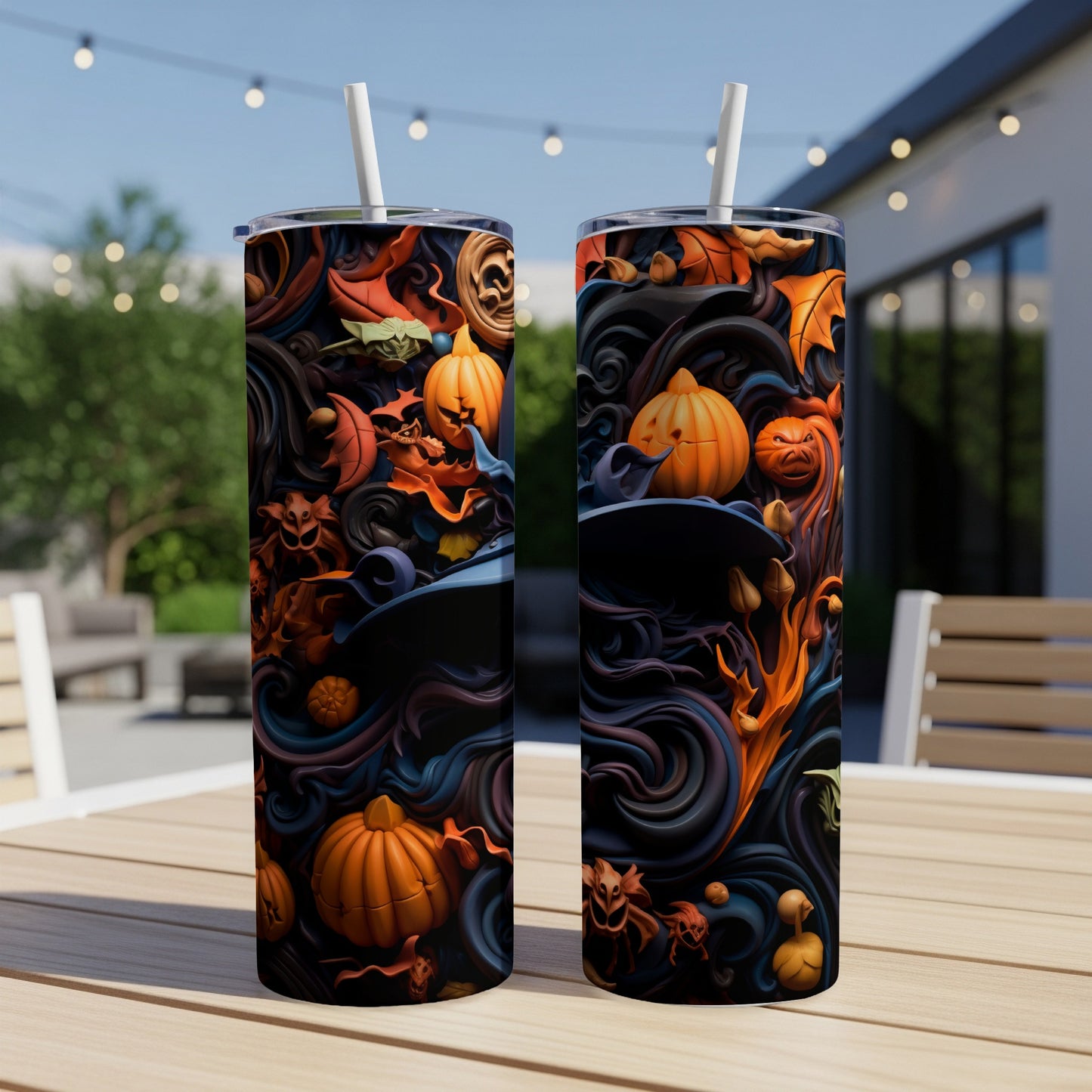 Two tumblers with a Halloween theme featuring pumpkins, leaves, and spooky creatures.