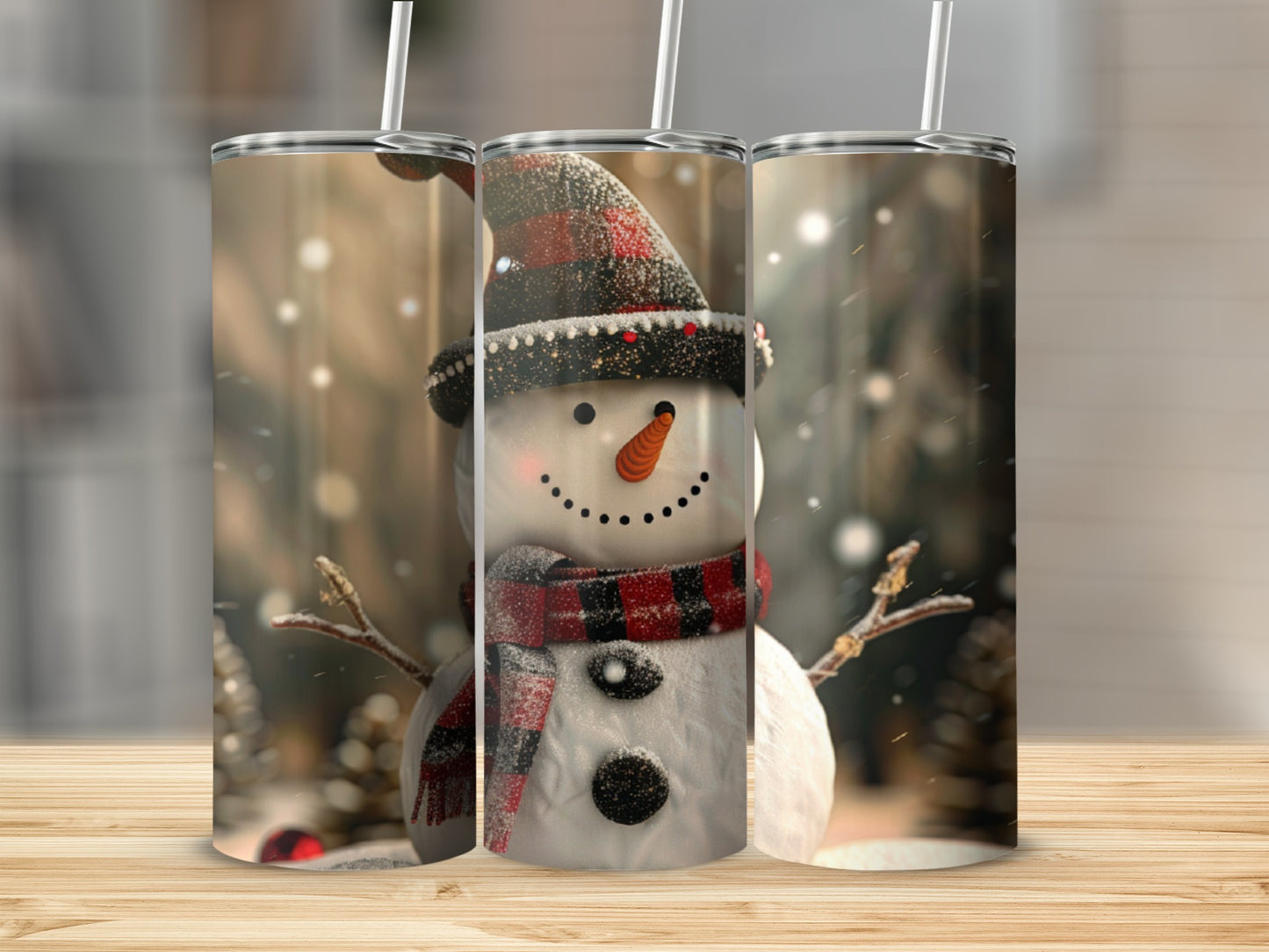 Three tumblers with a smiling snowman wearing a hat and scarf.