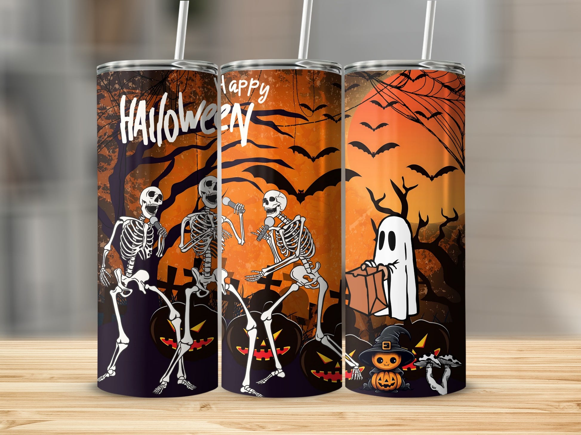 Happy Halloween tumbler with skeletons, pumpkins, ghost, and witch hat pumpkin.