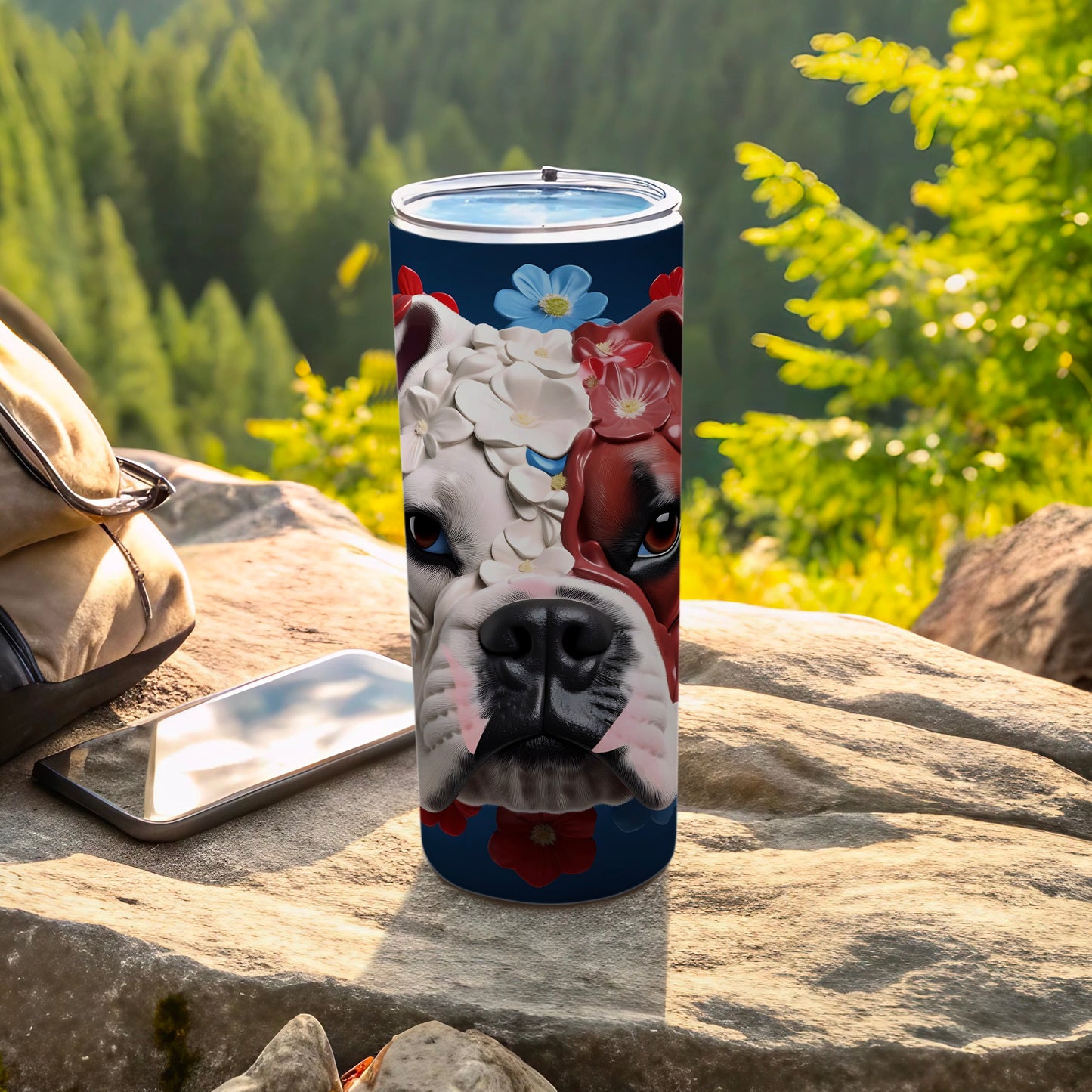 Bulldog face with floral accents on a blue tumbler.