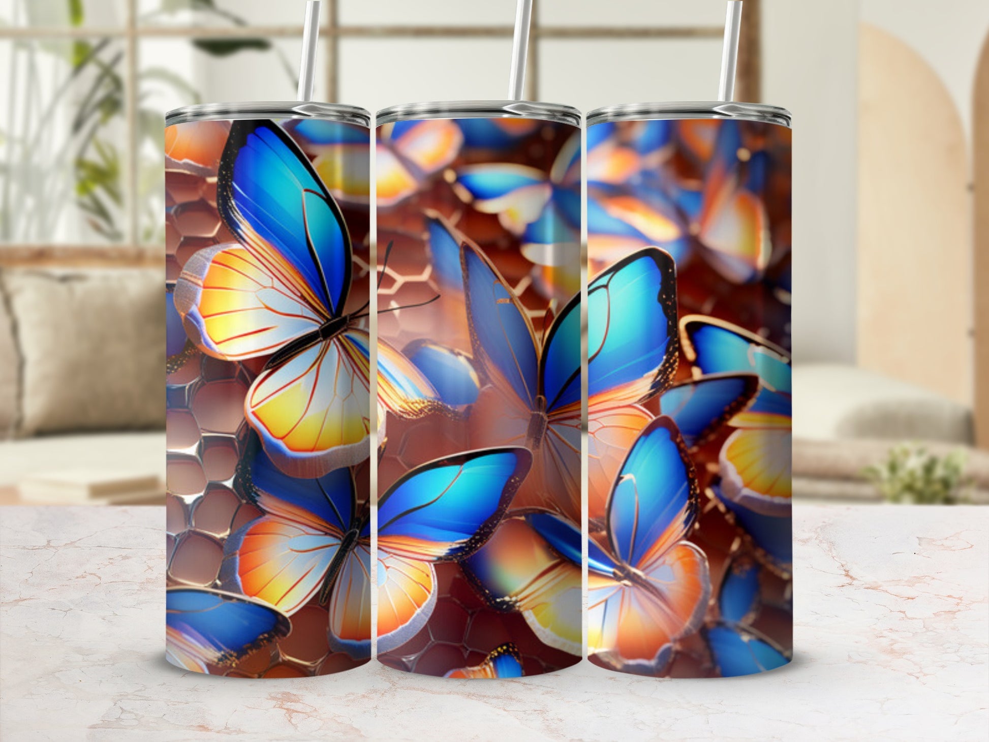 Triptych of tumblers featuring a close-up of blue and orange butterflies.