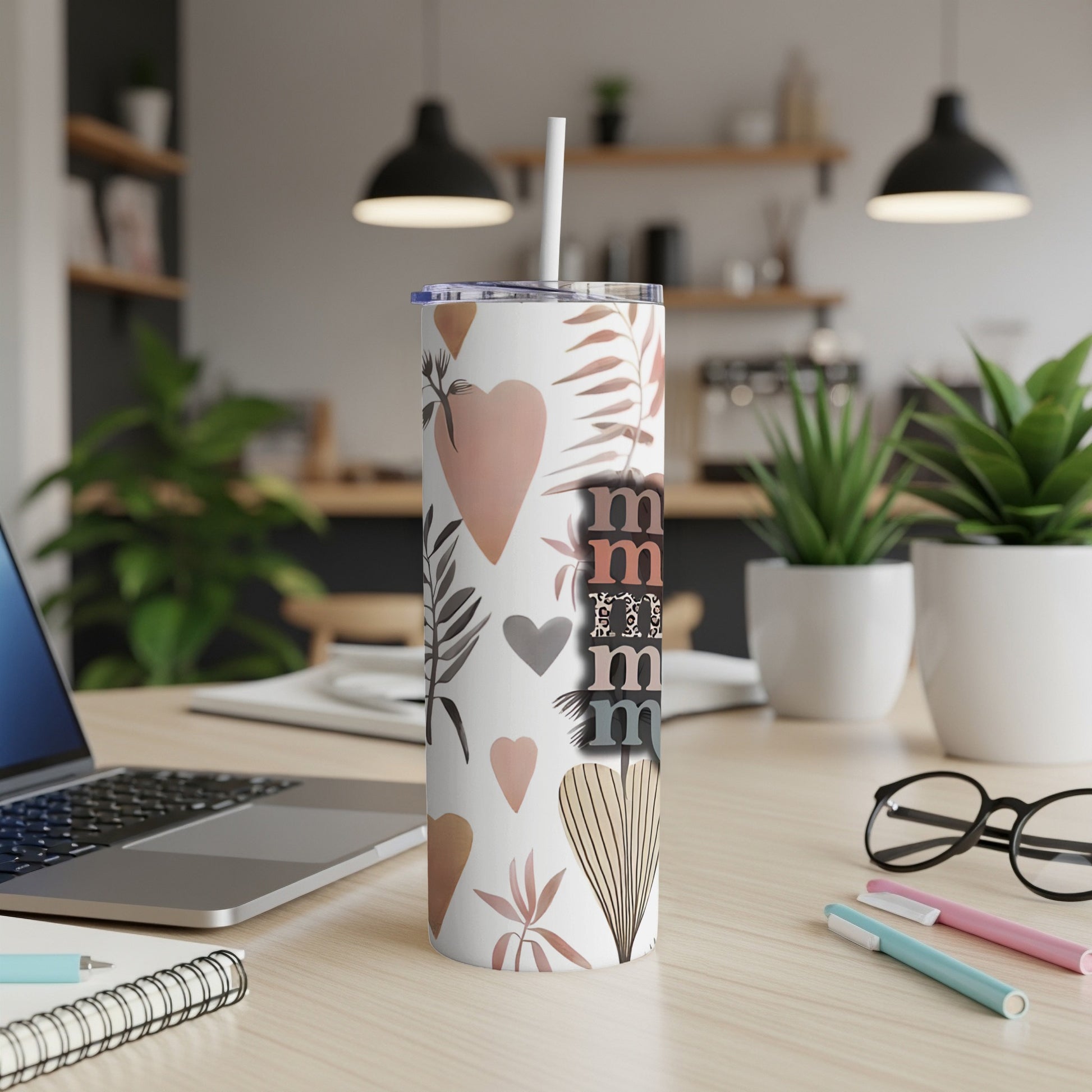Tumbler with heart and leaf pattern, "Mom" text.