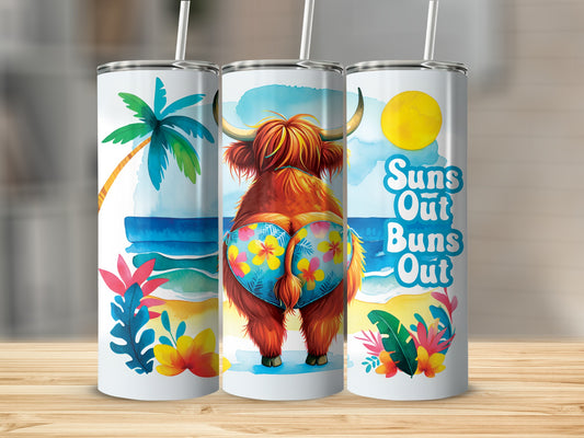 Highland cow in floral bikini on beach with text "Suns Out Buns Out".