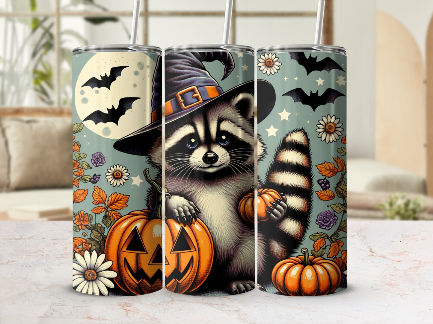Halloween tumbler with raccoon in witch hat and pumpkins.