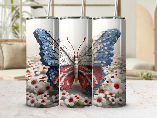 Tumbler with a patriotic butterfly design and white flowers.