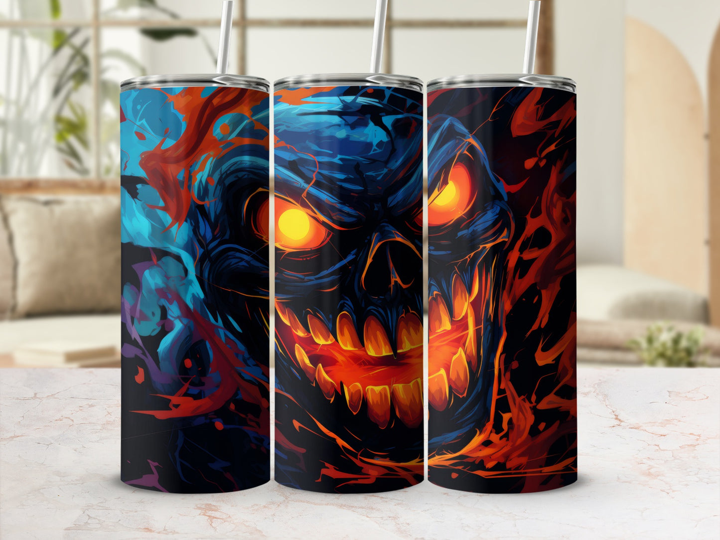 Three tumblers featuring an abstract, fiery skull design with glowing orange eyes.