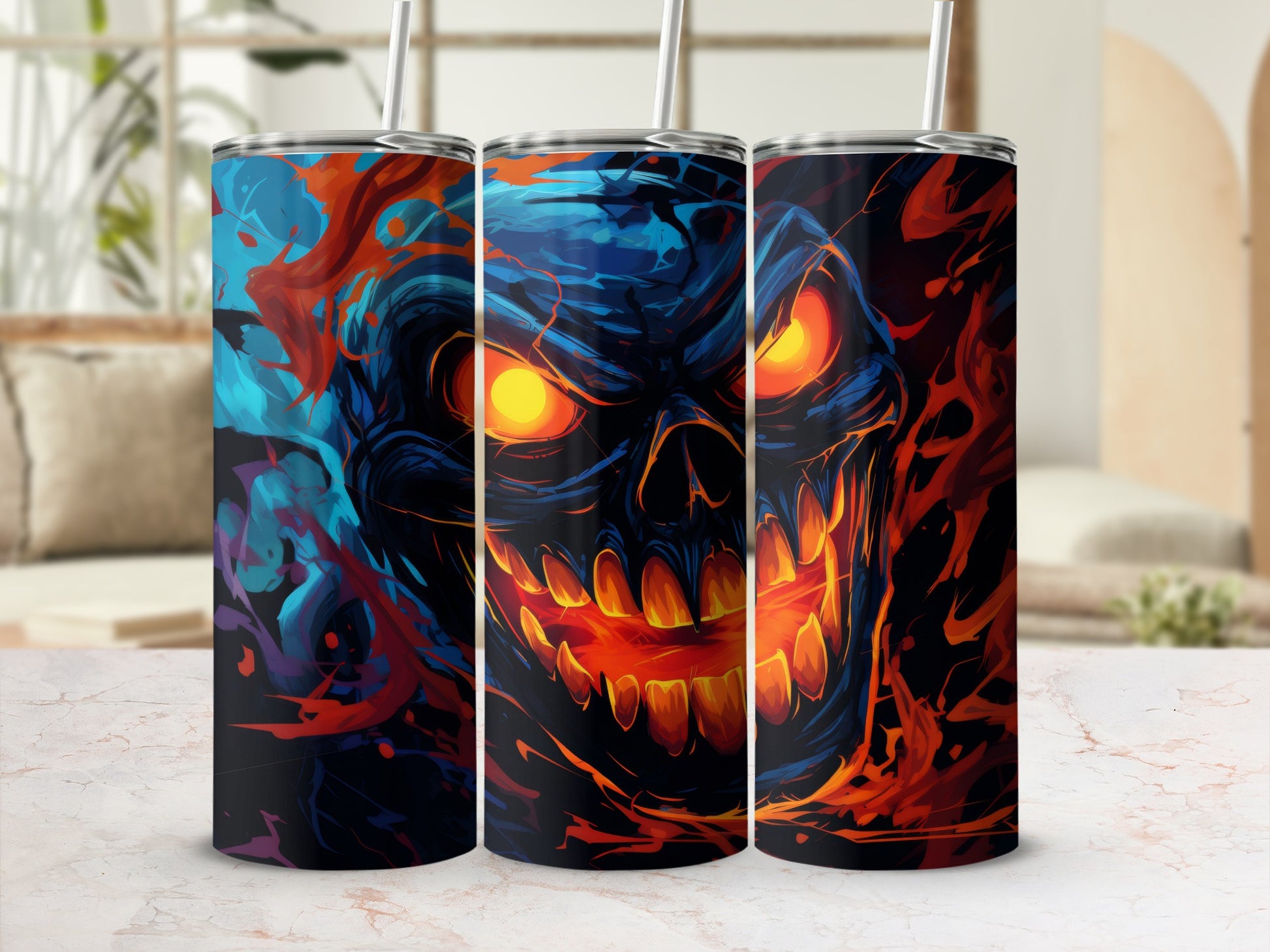 Three tumblers featuring an abstract, fiery skull design with glowing orange eyes.