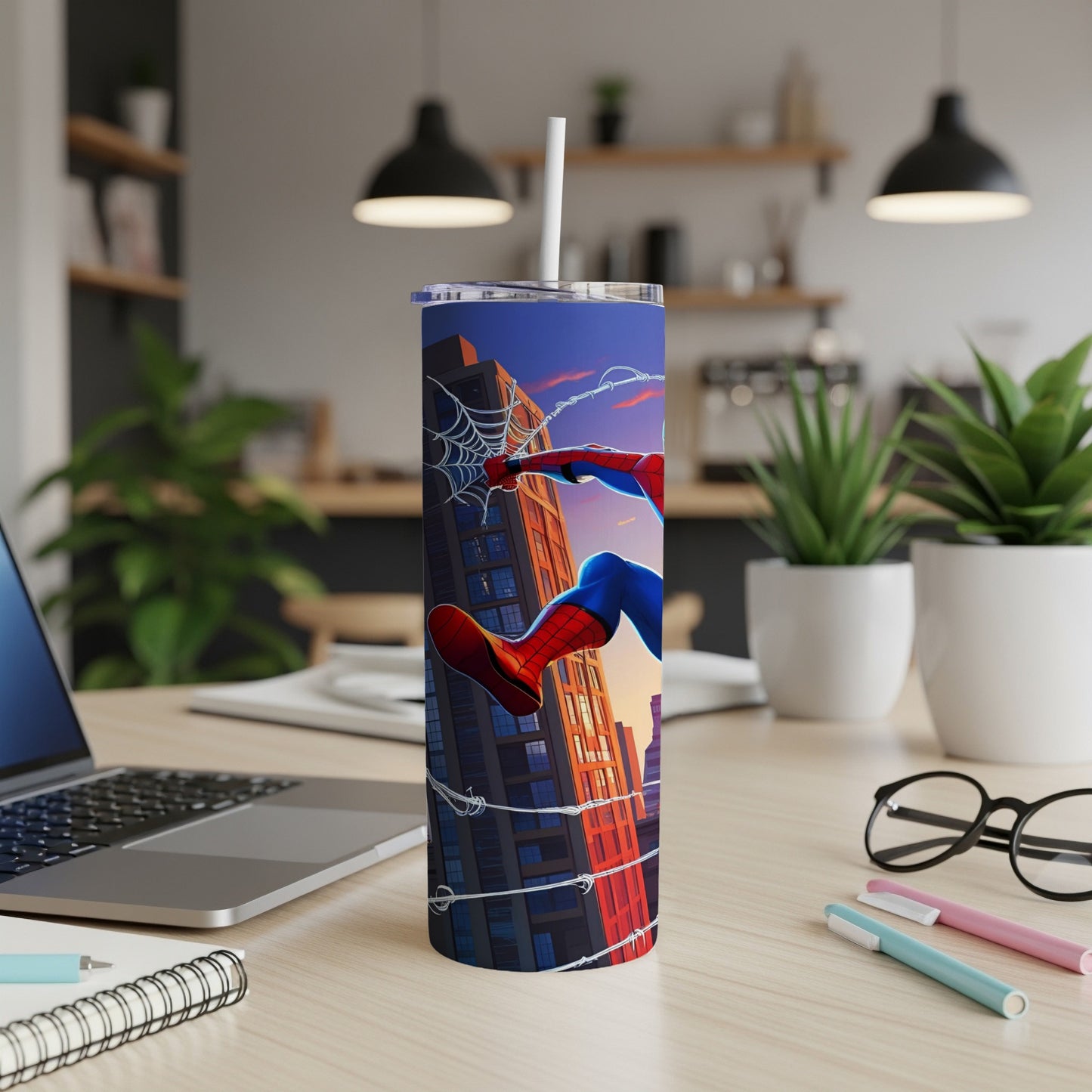 Spider-Man on a skyscraper, on a white tumbler with a straw.