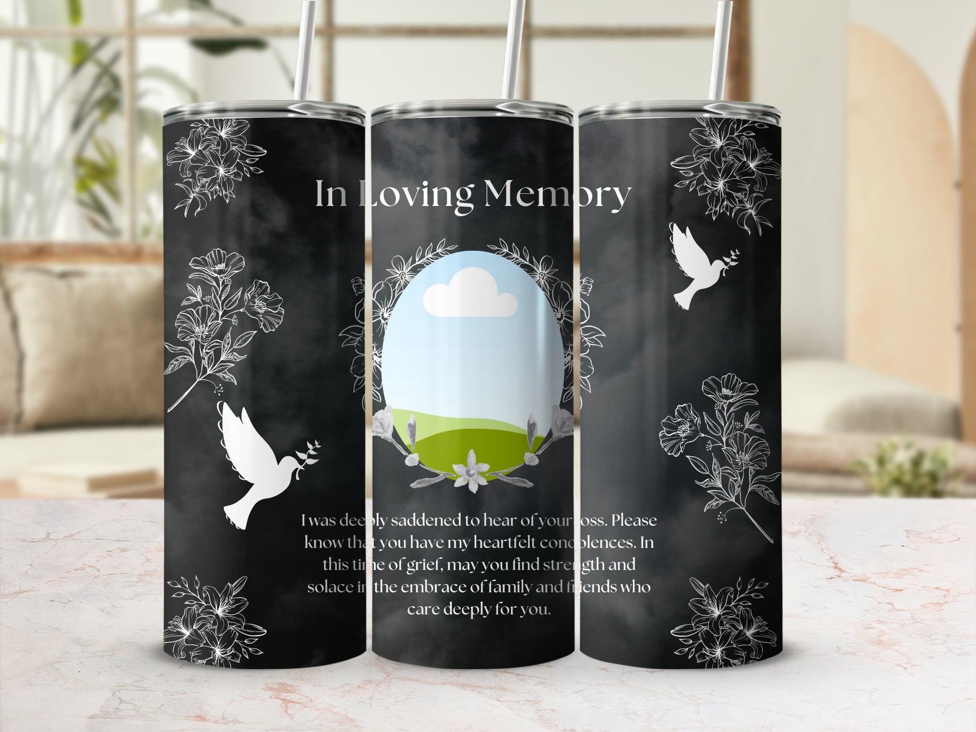 Tumbler with "In Loving Memory" text and floral/dove design.