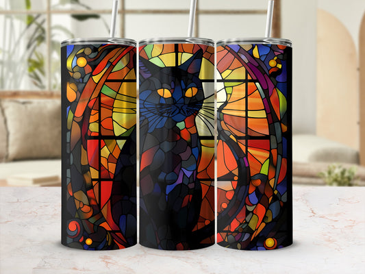 Black cat with yellow eyes in stained glass art on a tumbler.