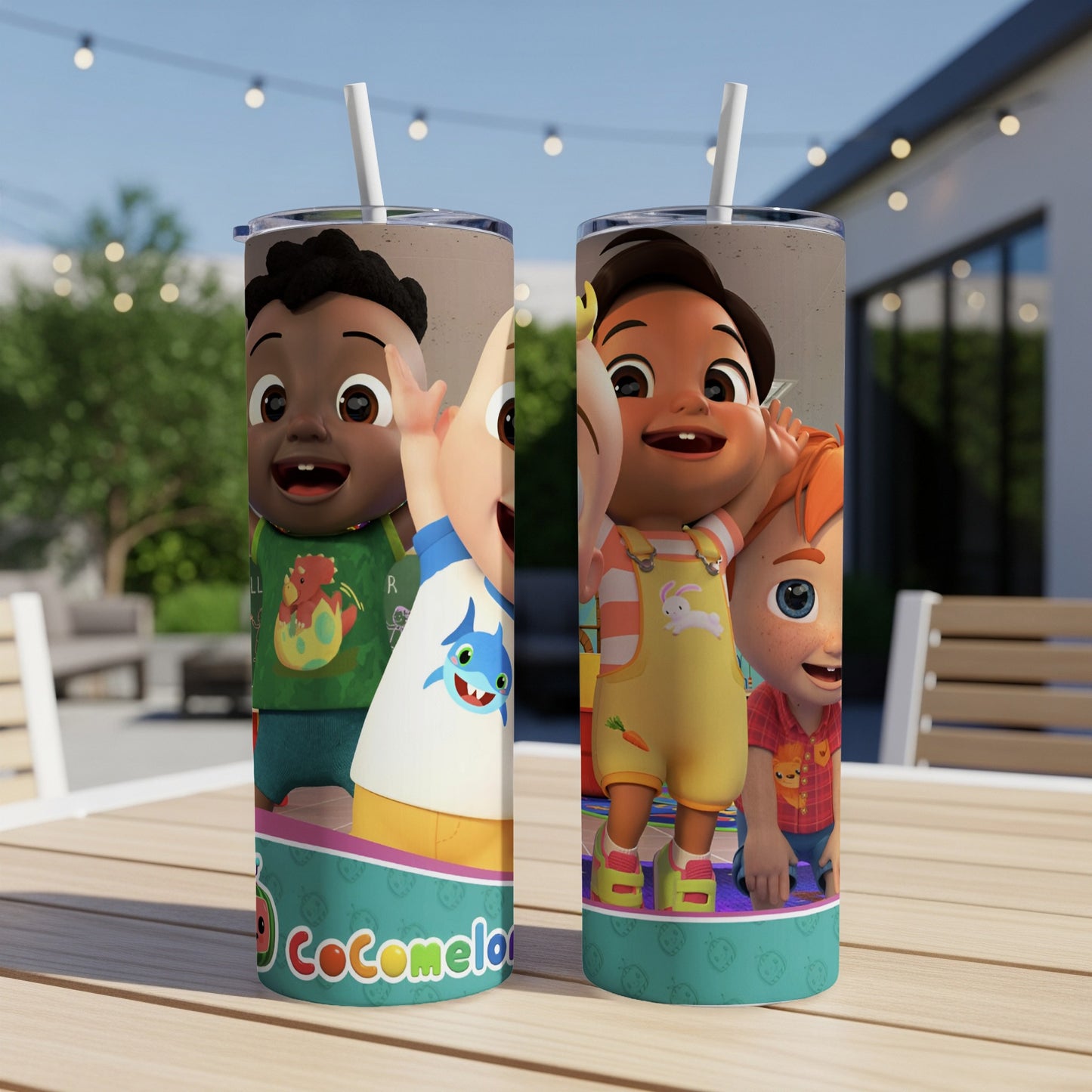 Cocomelon characters JJ and Cody on a green and teal patterned tumbler.