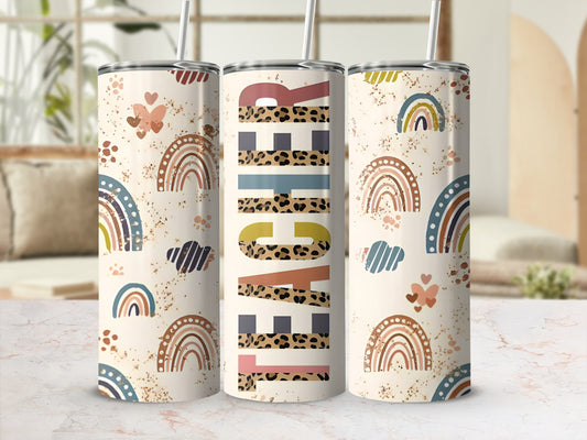 Rainbow and leopard print teacher tumbler with colorful abstract shapes.