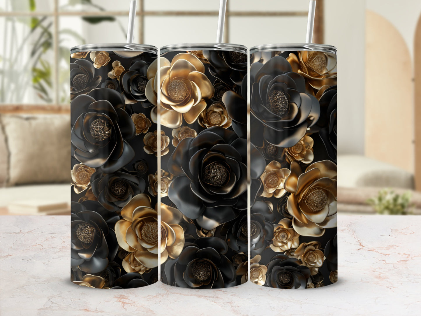 Three tall tumblers with black and gold floral patterns.
