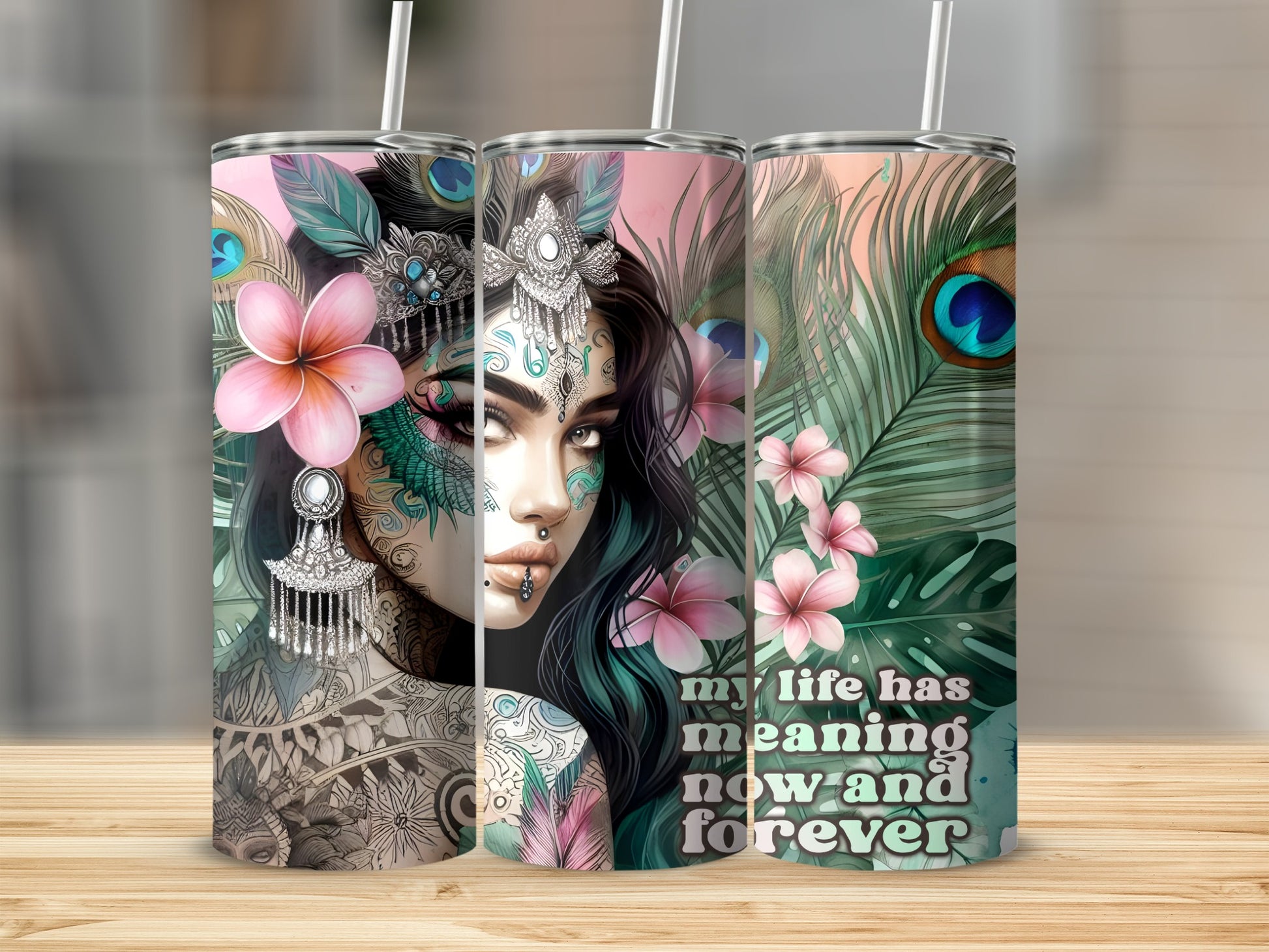 Three tumblers featuring a woman with bohemian tattoos and feathers, one with text.