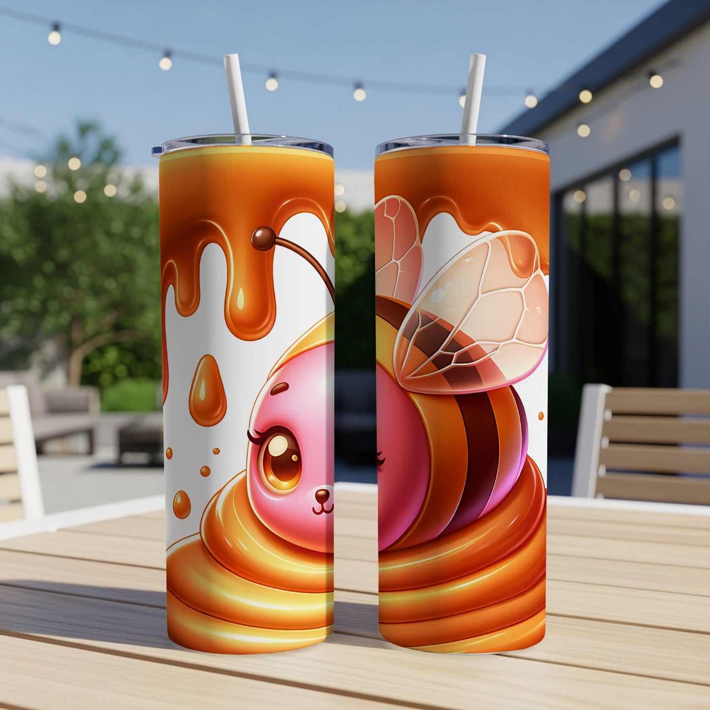 Two insulated tumblers featuring a cute bee illustration with honey drips.