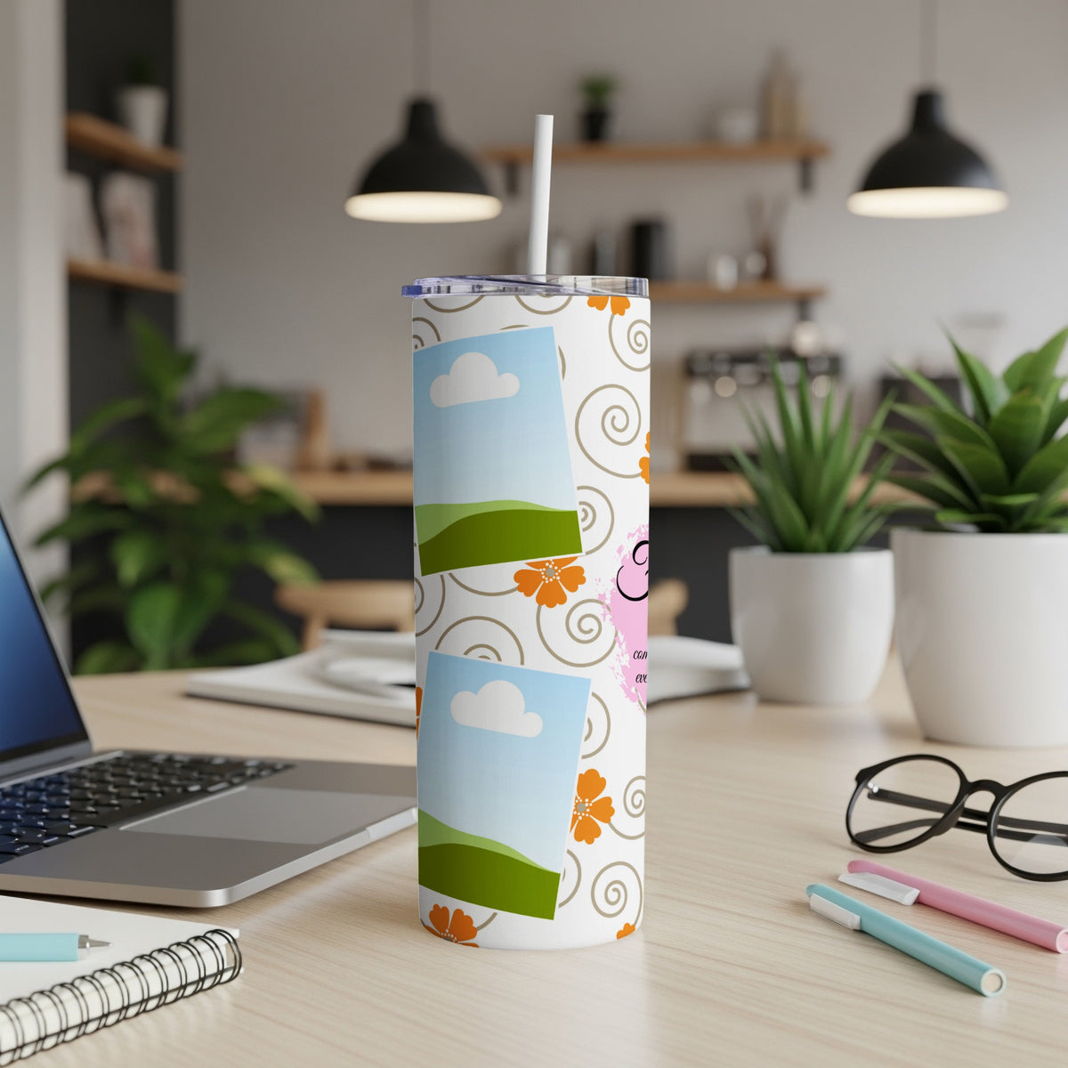 Tumbler with custom photo frames, orange flowers, and swirling pattern.