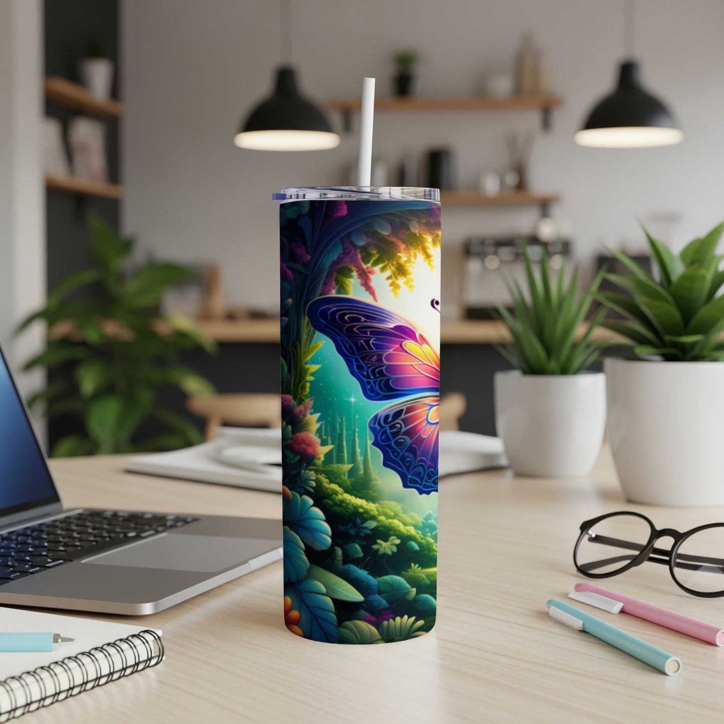 Tall tumbler with a vibrant butterfly and colorful forest design.