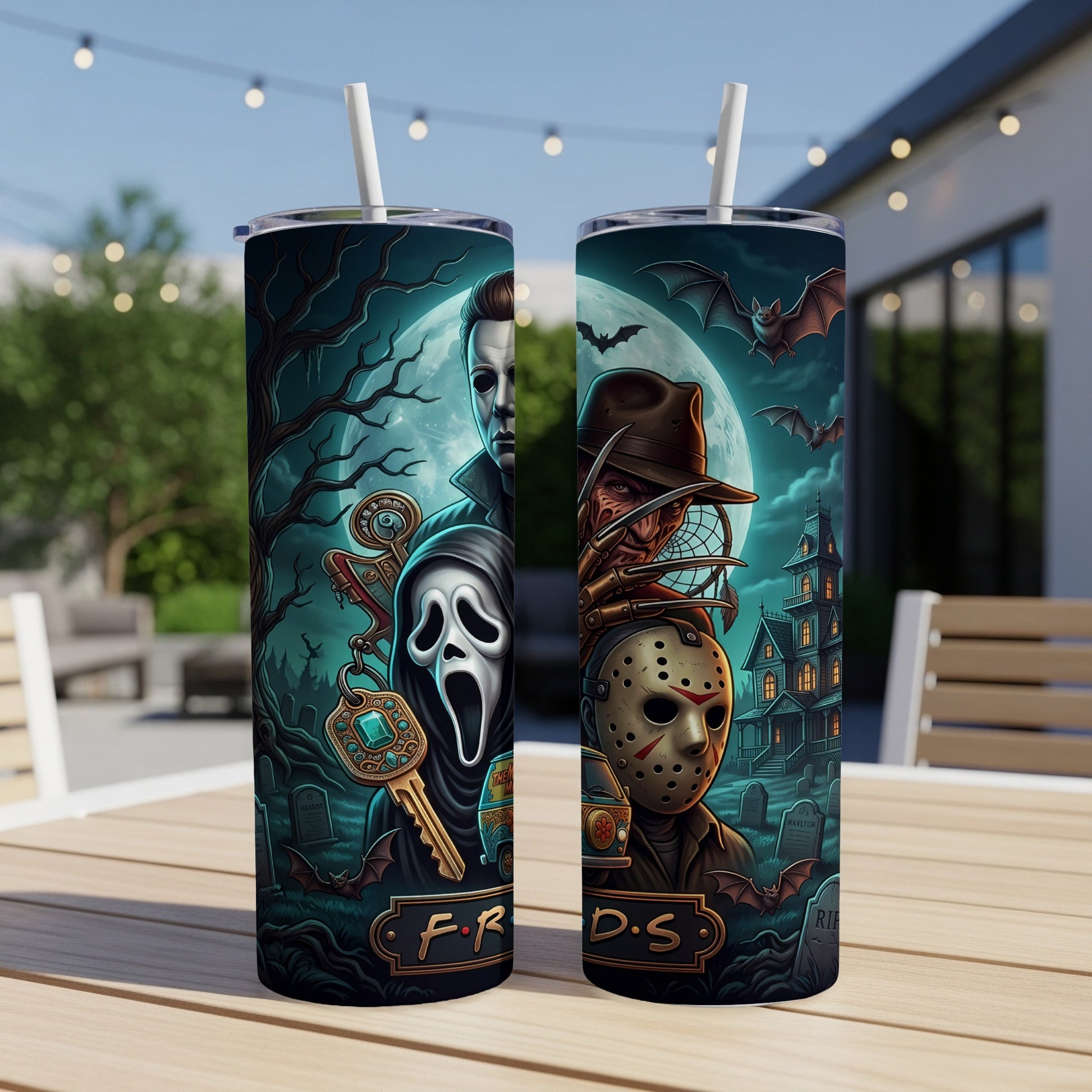 Two tumblers featuring horror movie characters and "F.R.I.E.N.D.S." logo on a table.