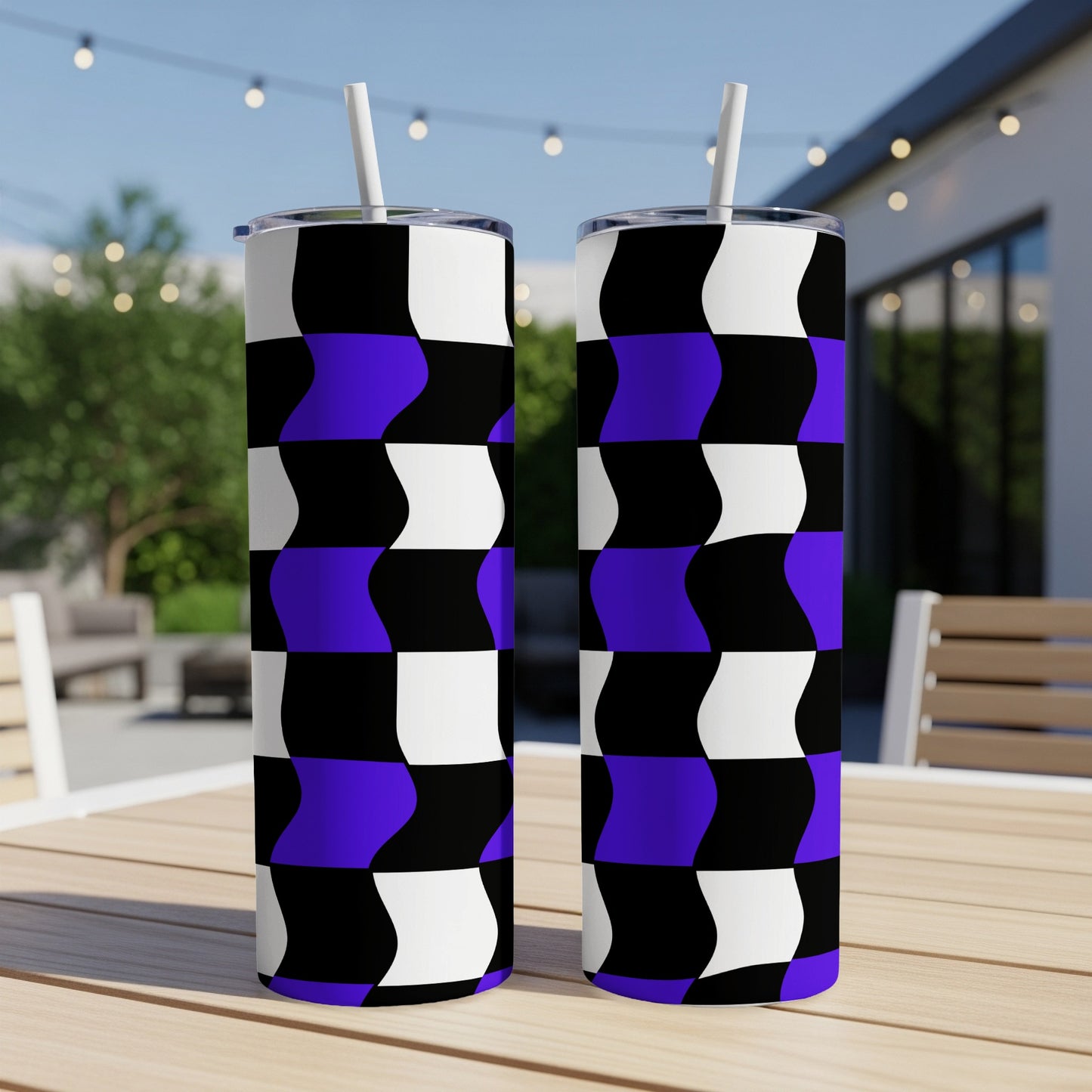 Two tall tumblers with a black, white, and purple checkered pattern.