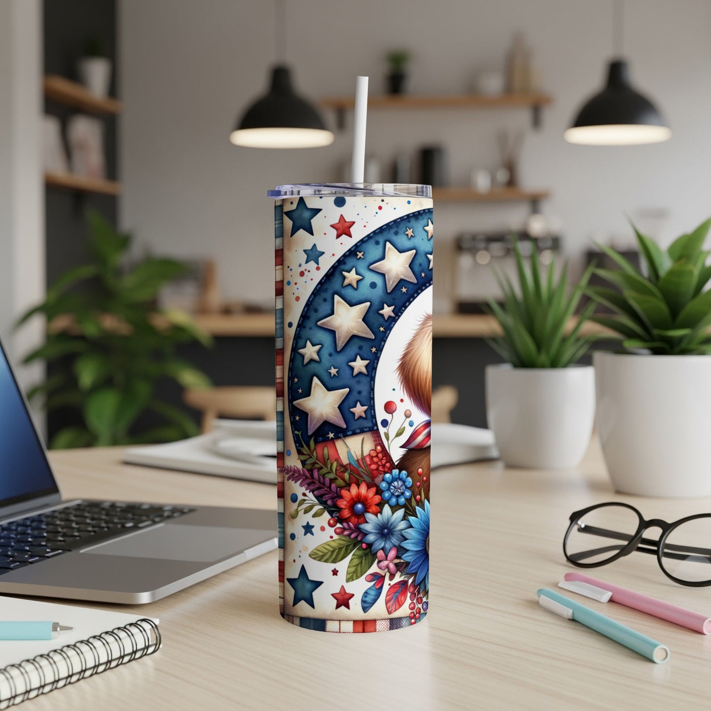 Tall tumbler with patriotic stars, flowers, and a dog's face.