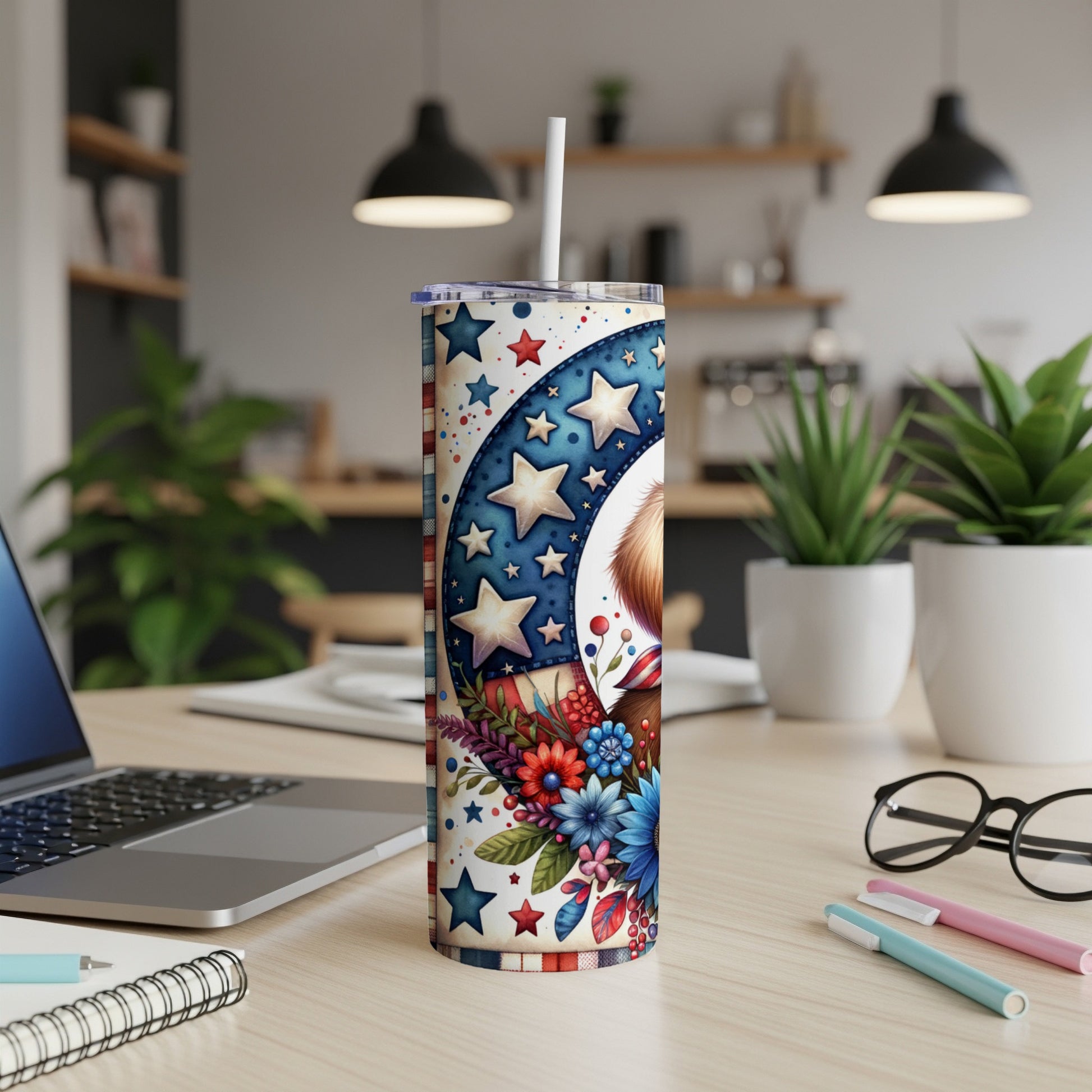 Tall tumbler with patriotic stars, flowers, and a dog's face.