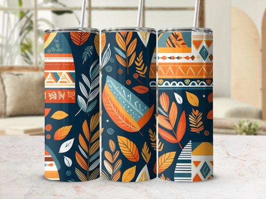 Three patterned tumblers with floral and geometric designs in warm autumn colors.