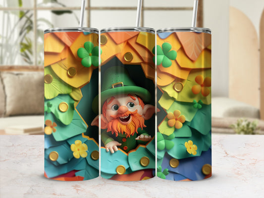 Leprechaun peeking out of a colorful, leafy, shamrock-decorated tumbler.