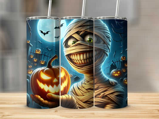 Halloween tumbler with mummy holding a jack-o'-lantern under a full moon.