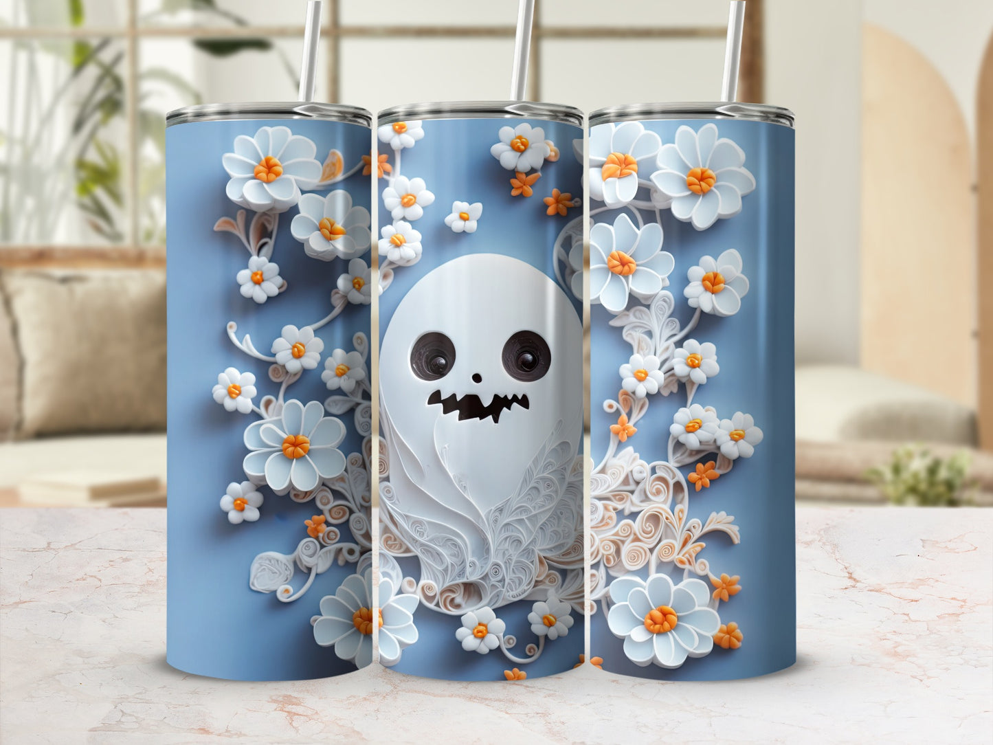Three tumblers with a light blue background, featuring a cartoon ghost and white flowers.
