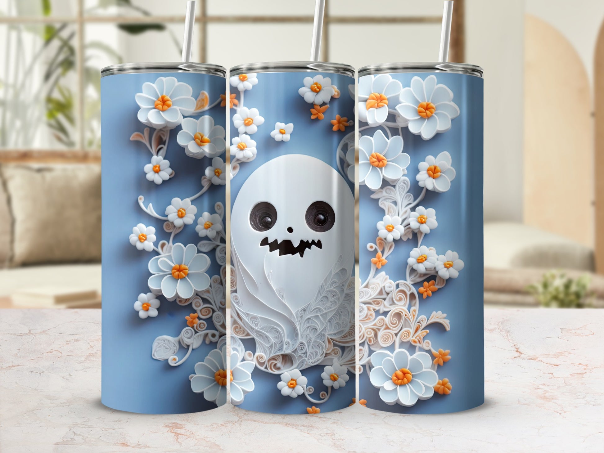 Three tumblers with a light blue background, featuring a cartoon ghost and white flowers.
