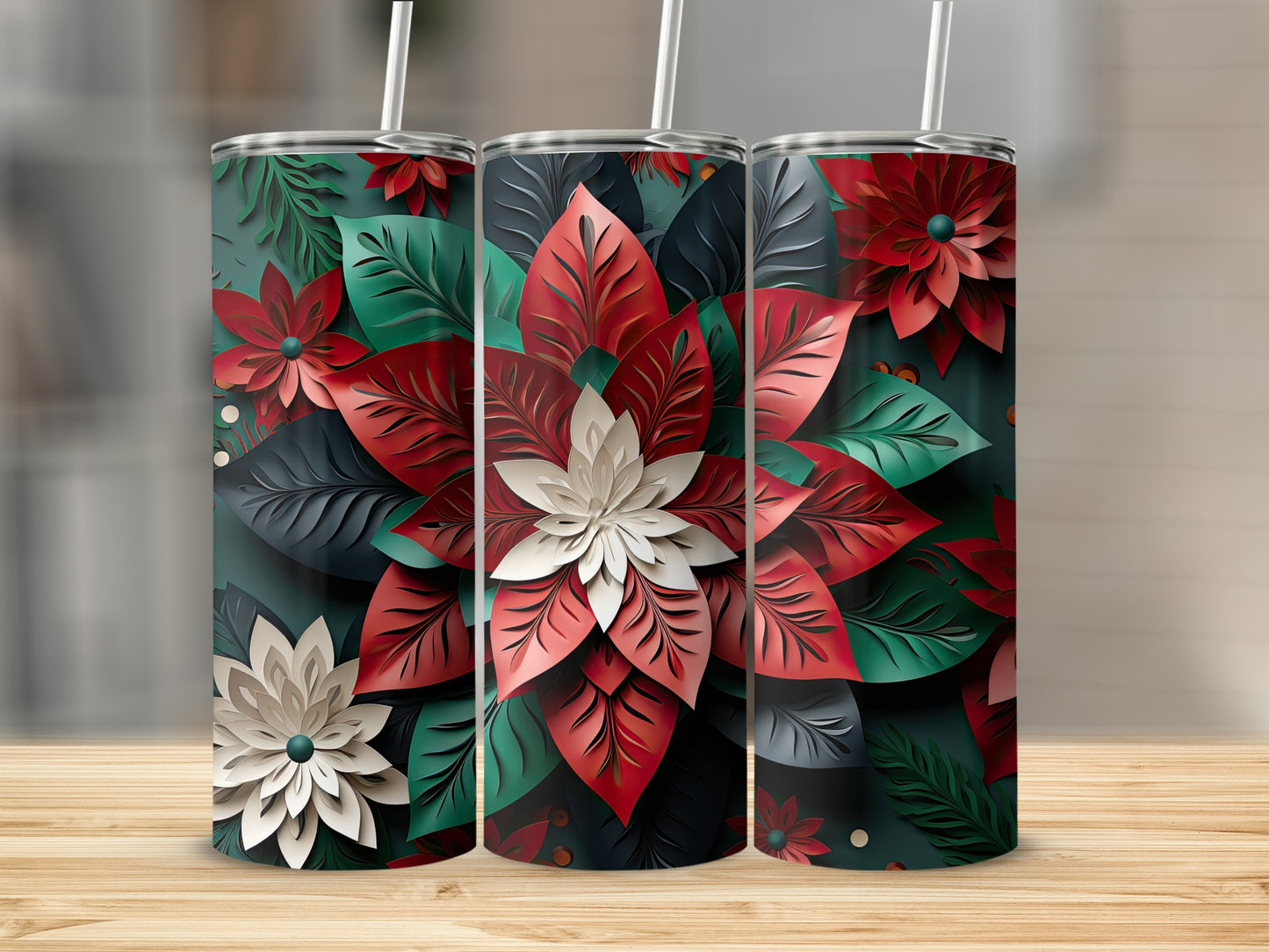 Three tumblers with a red and green poinsettia floral design.