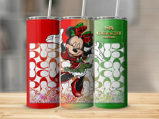 Minnie Mouse in festive outfit with Coach pattern tumblers.