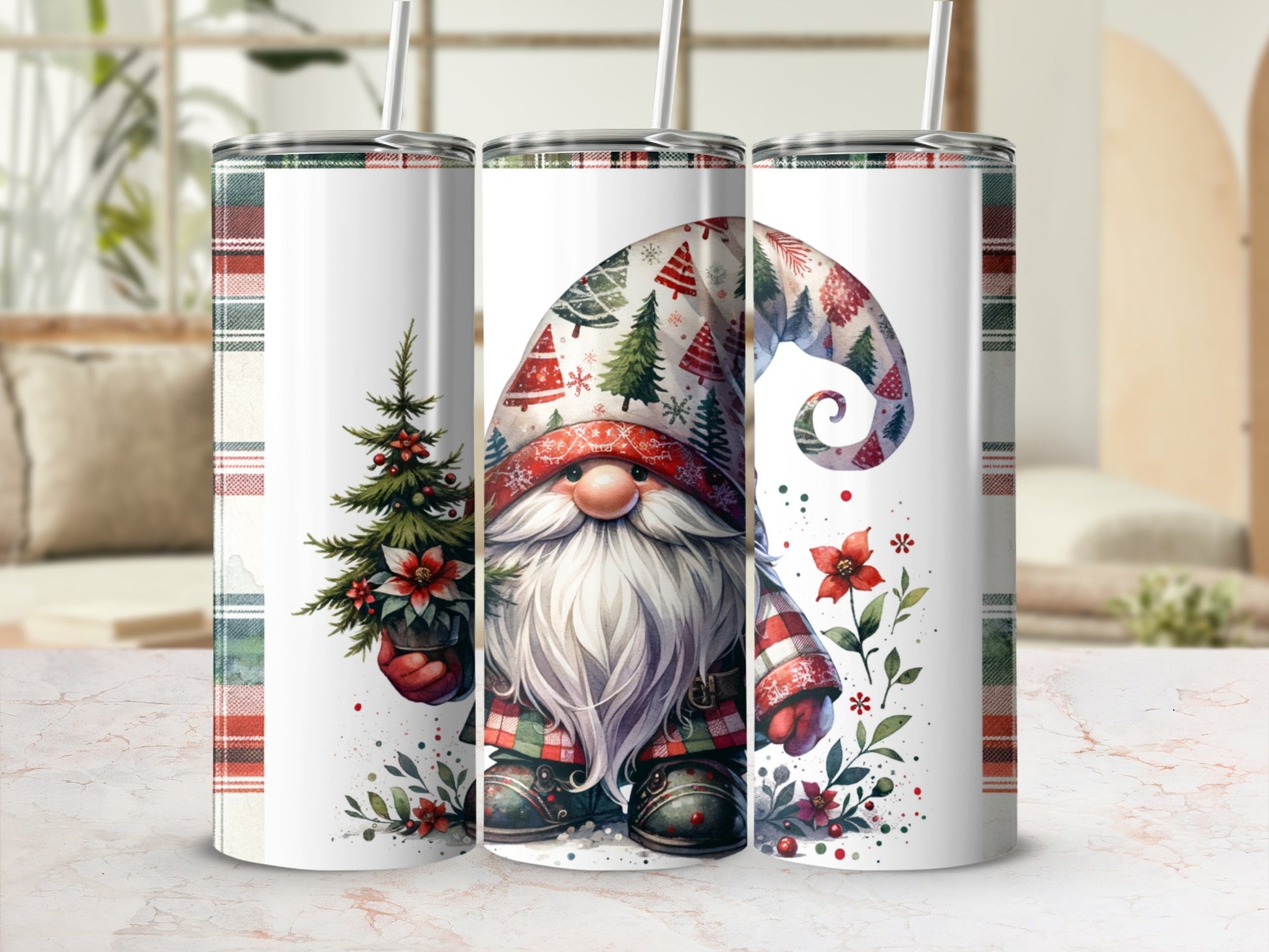 Three Christmas gnomes with Santa hats and festive designs on tumblers.