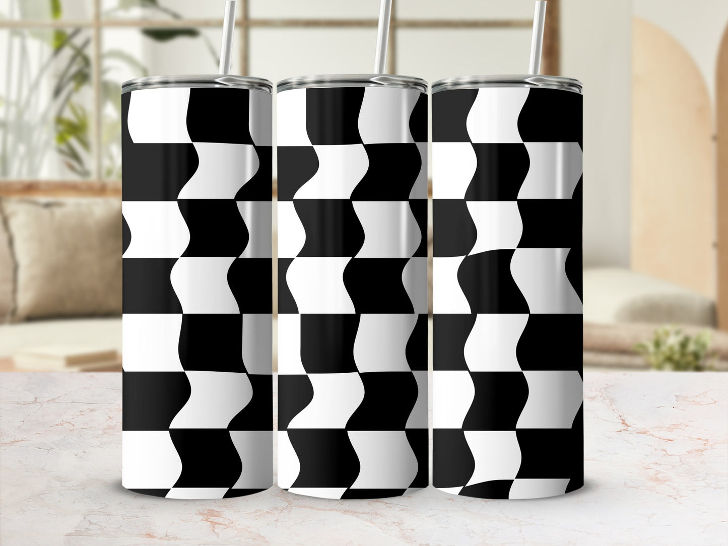 Black and white checkered wave pattern on three stainless steel tumblers.
