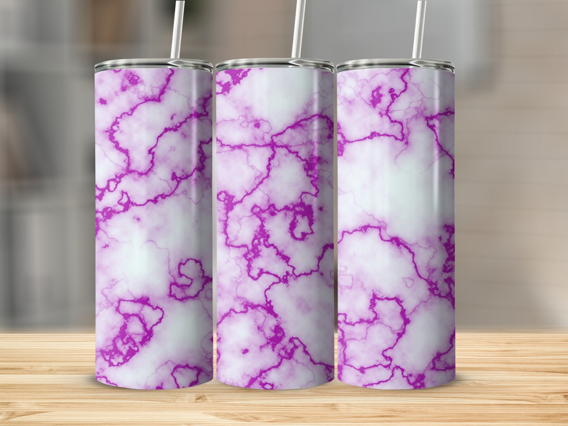 Three white tumblers with purple marble pattern and straws.
