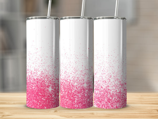Three white tumblers with pink glitter gradient and straws.