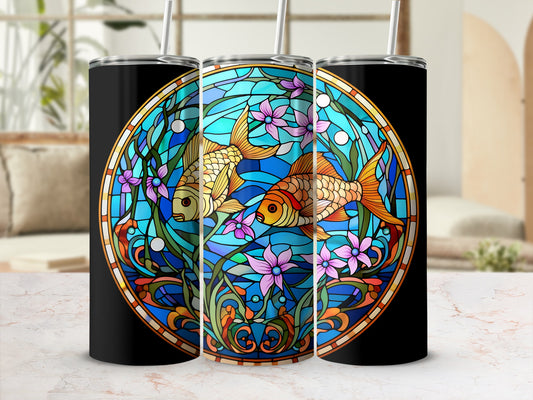 Black tumbler with stained glass design of two goldfish swimming among flowers.