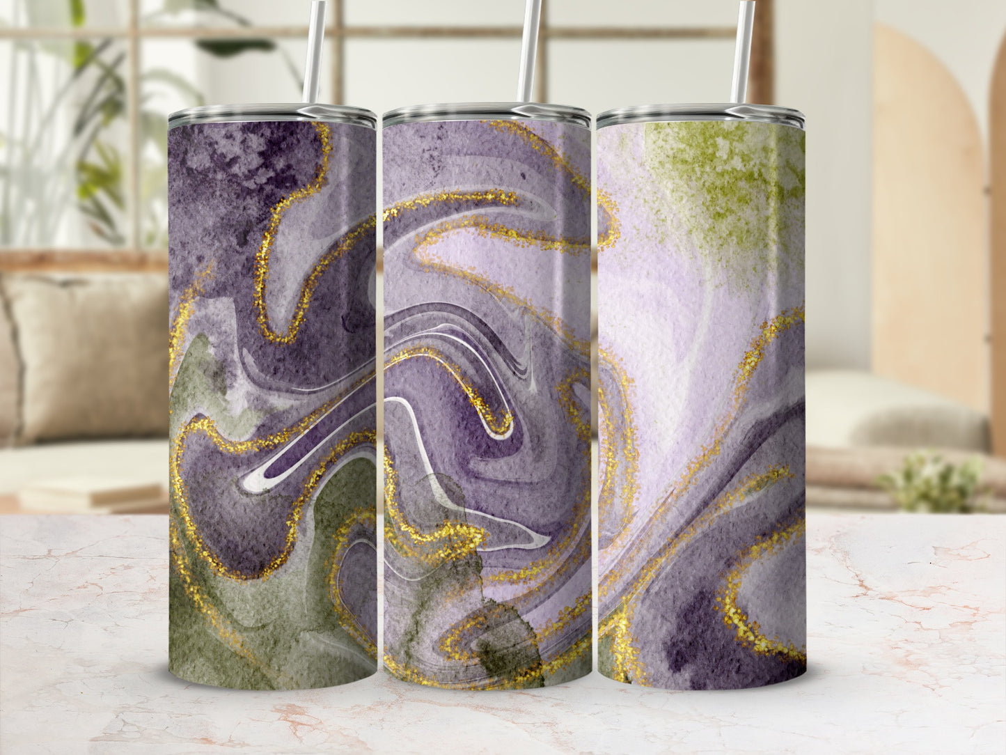 Three tumblers with marbled purple, green, and gold abstract designs.