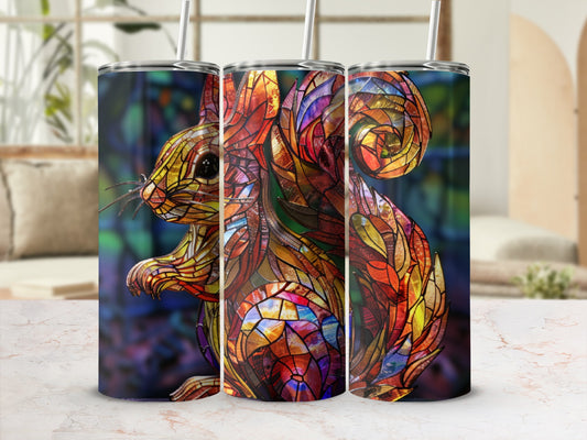 Stained glass squirrel design on three tumblers with straws.