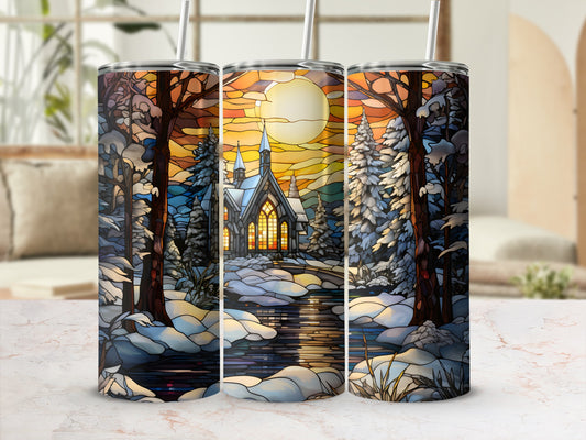 Winter stained glass scene with church, trees, and snow-covered landscape.