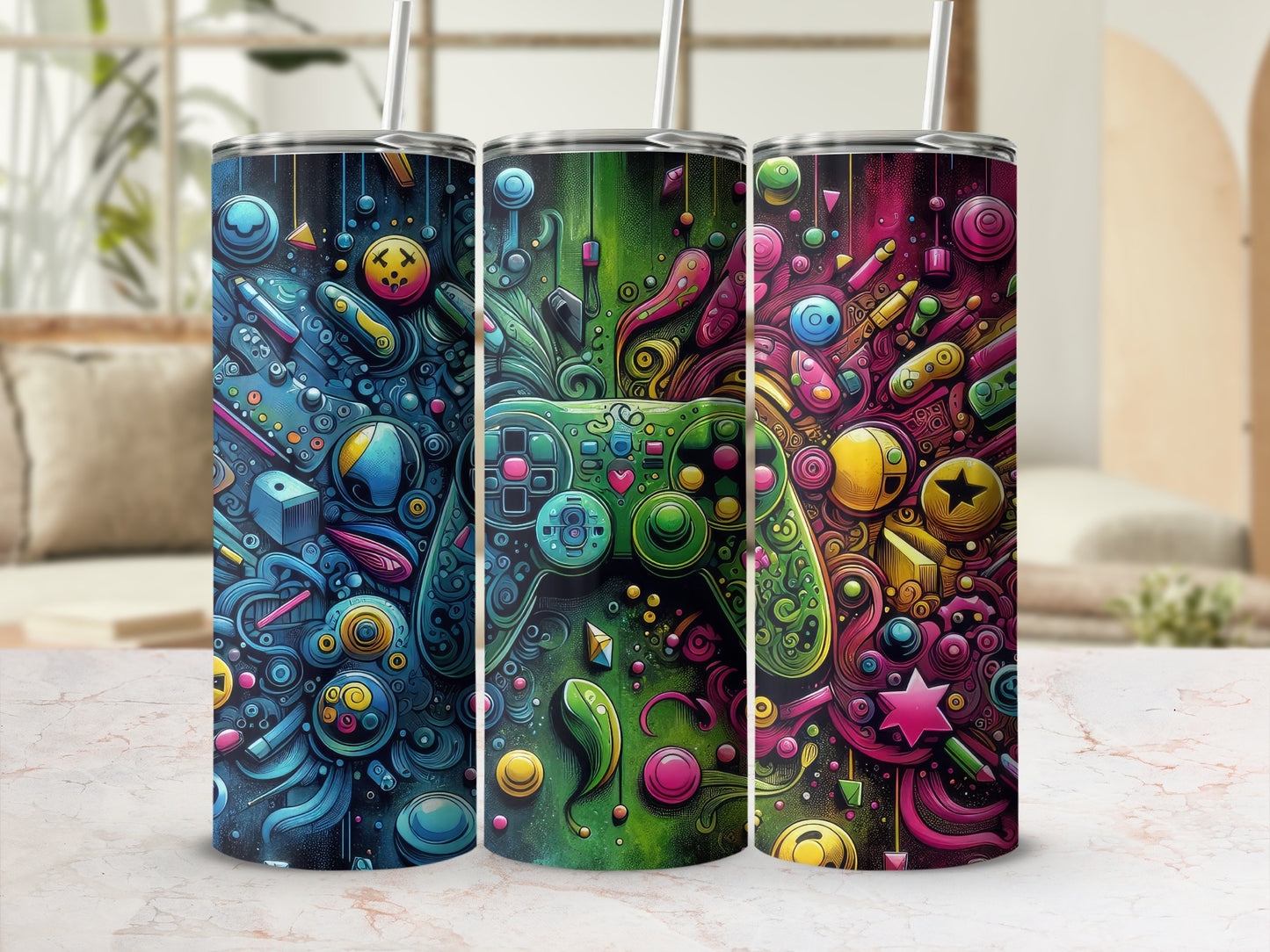Three vibrant tumblers featuring abstract, colorful video game controller designs.