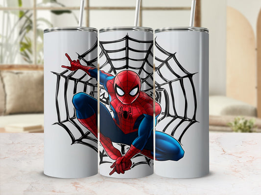 Spiderman crouches with a spider web design on a white tumbler.