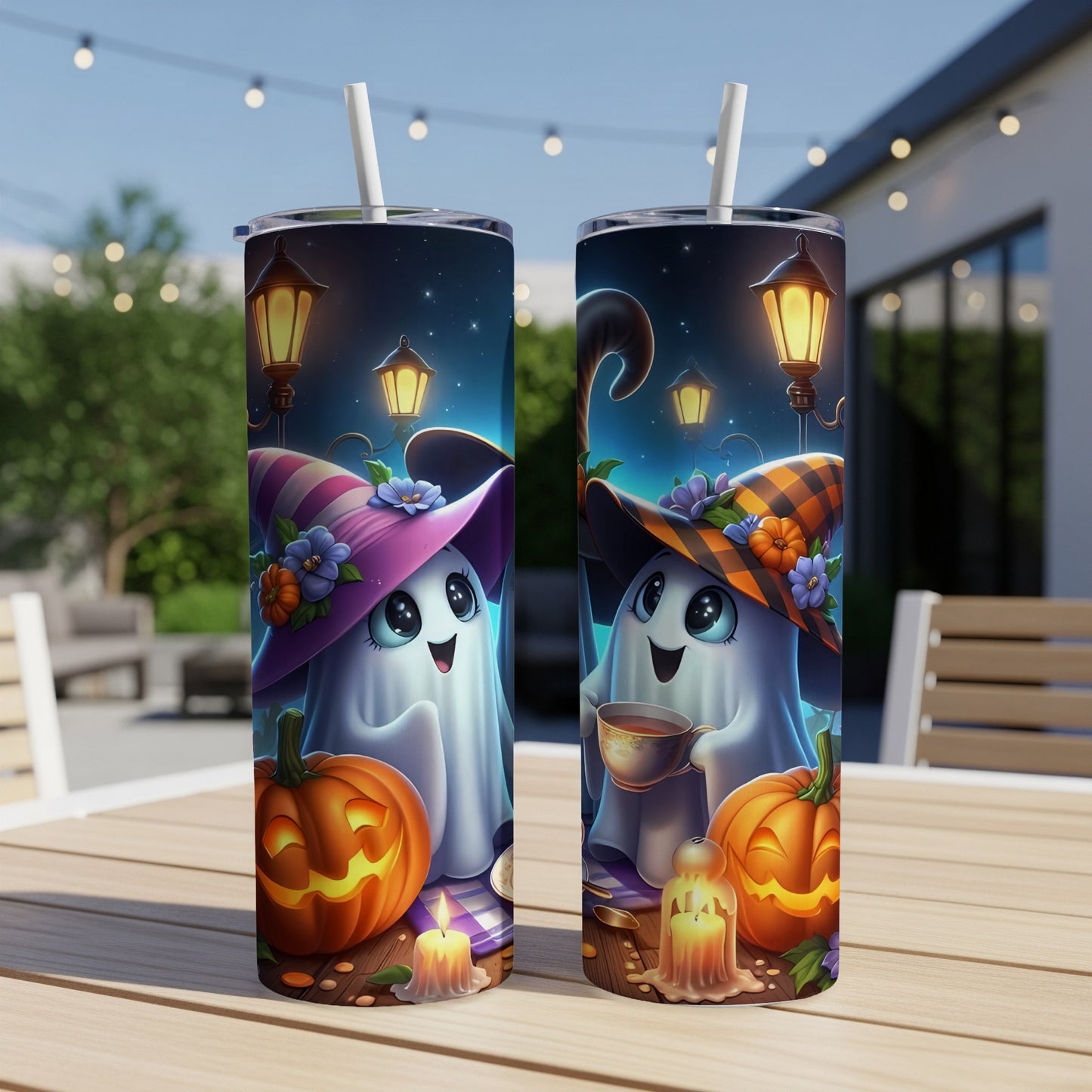 Two Halloween themed tumblers with ghosts, pumpkins, and streetlights.