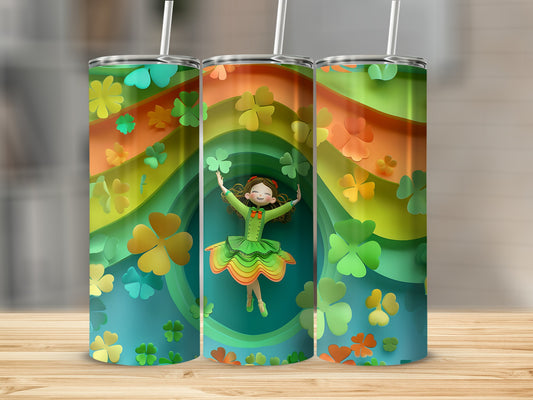 Shamrock patterned tumbler with dancing girl on rainbow background.