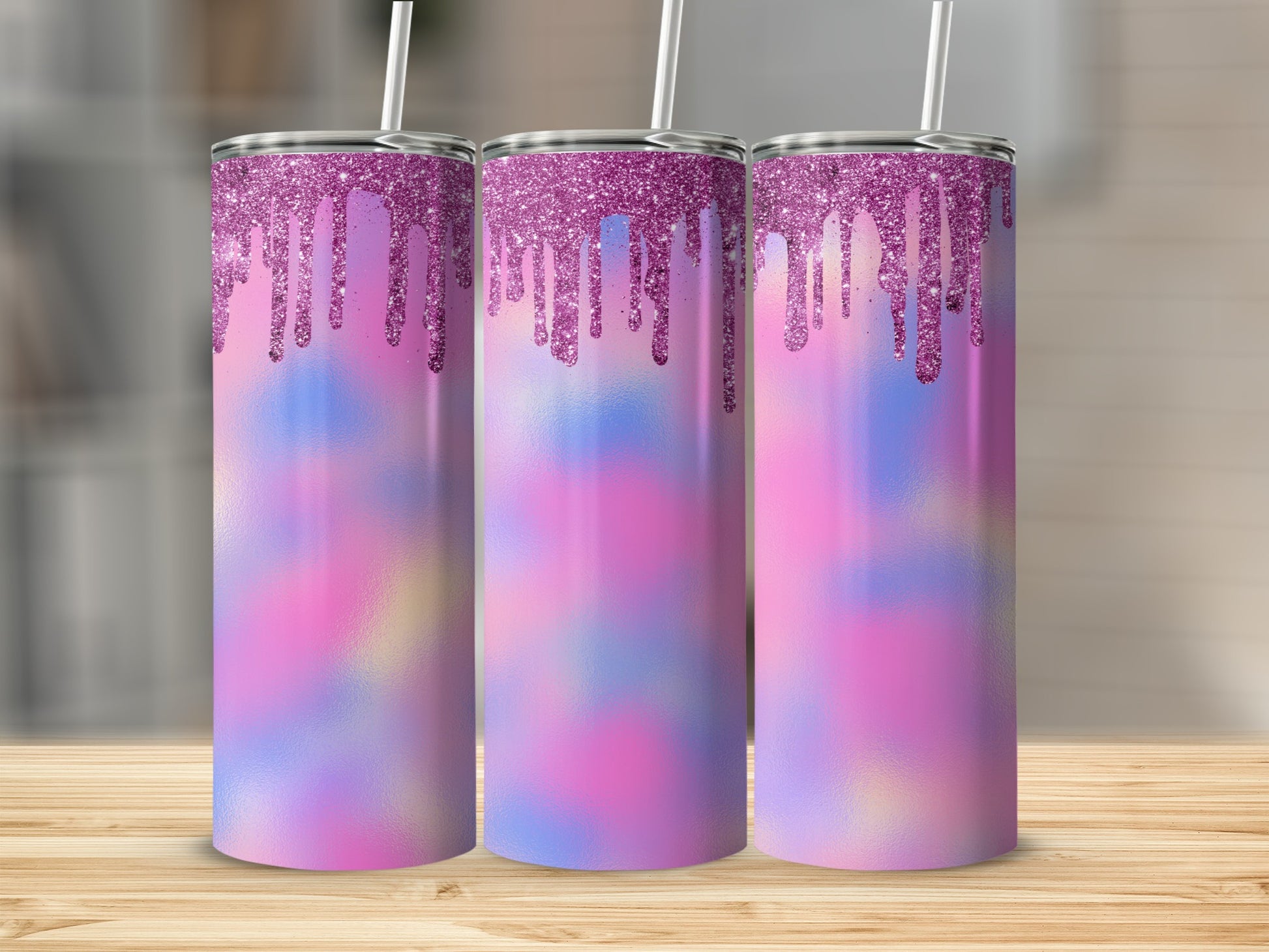 Three tumblers with glitter drips and pastel watercolor design.