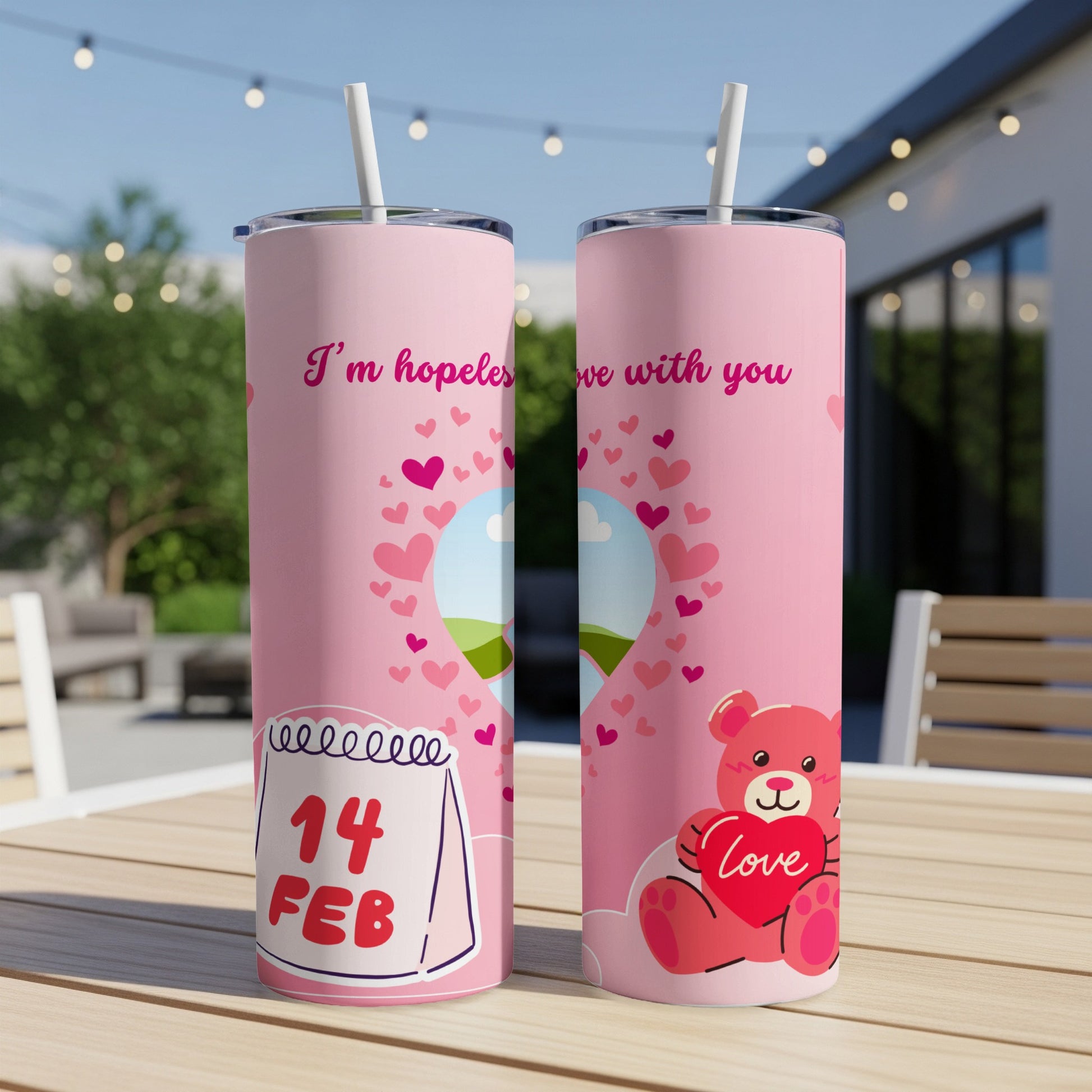 Pink tumblers with Valentine's Day designs, hearts, a teddy bear, and "14 FEB" text.
