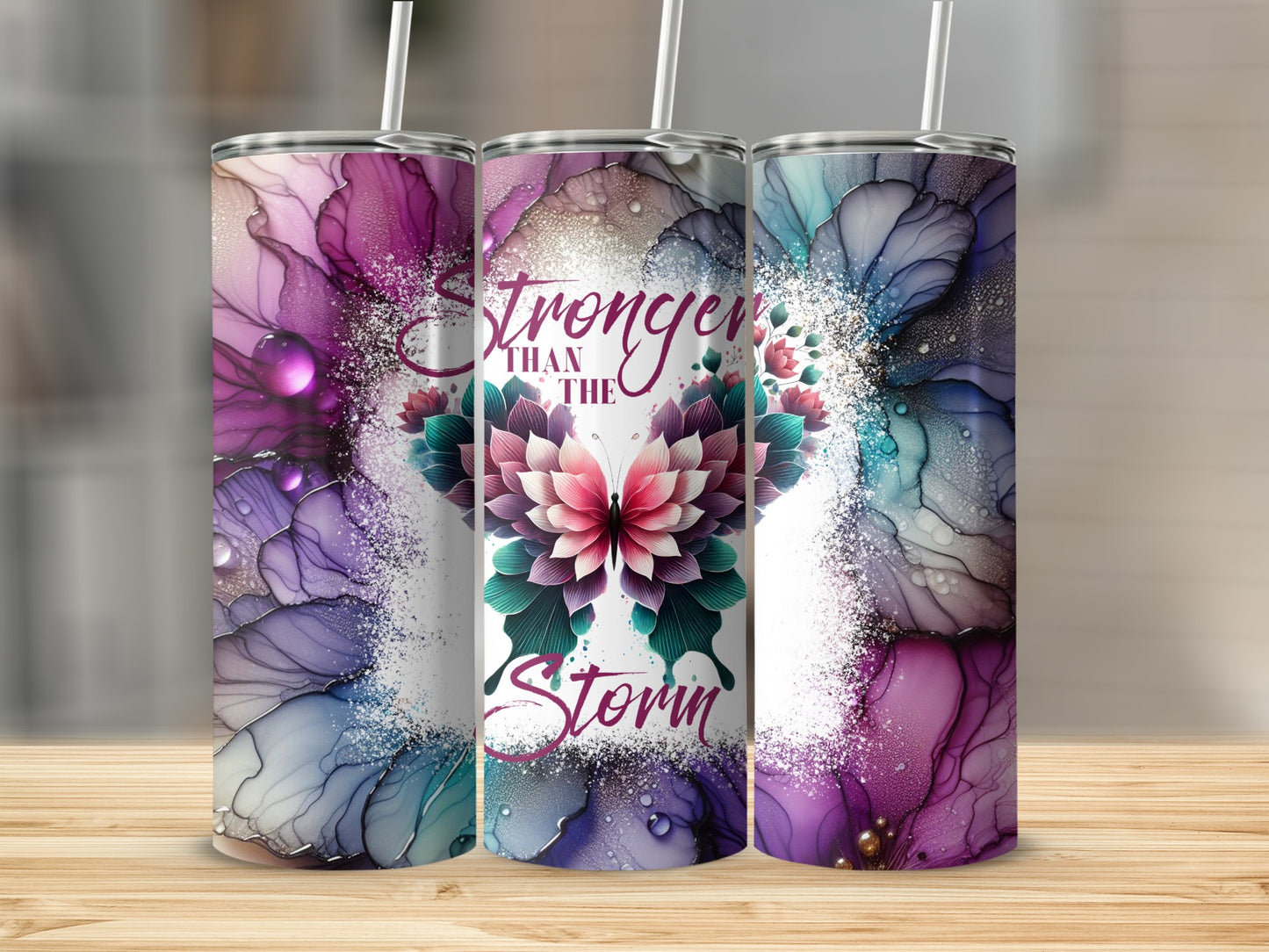 Pink and purple alcohol ink tumbler with butterfly design and text.