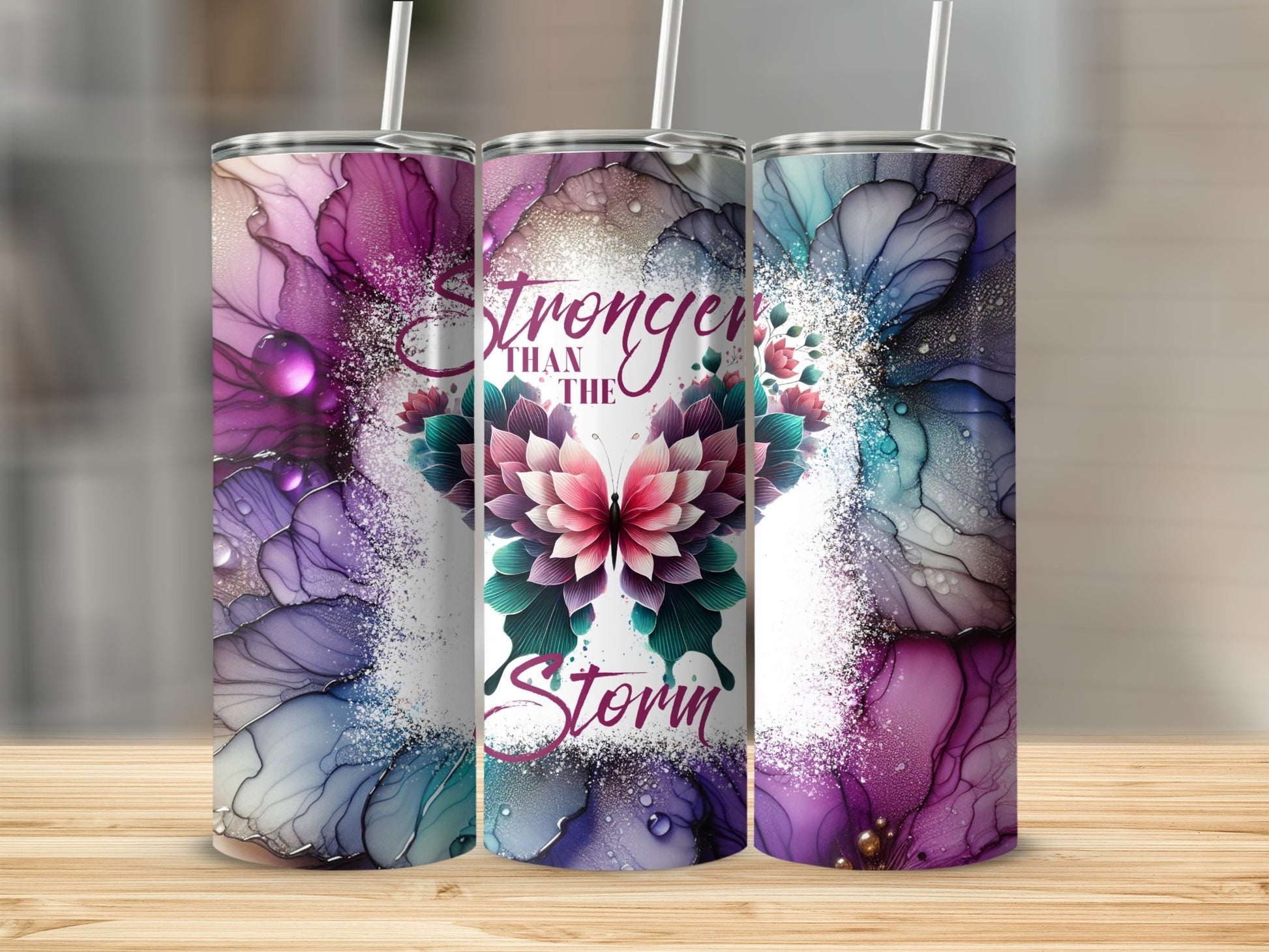 Pink and purple alcohol ink tumbler with butterfly design and text.