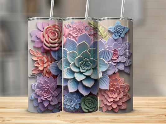 Three tall tumblers decorated with pastel floral relief designs.